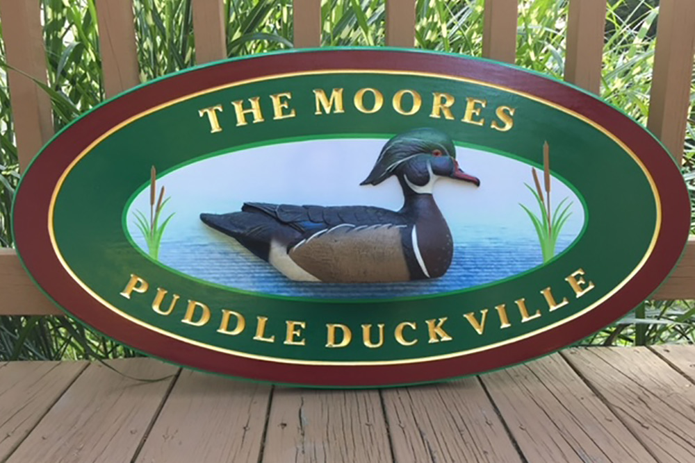 carved and mounted sign
