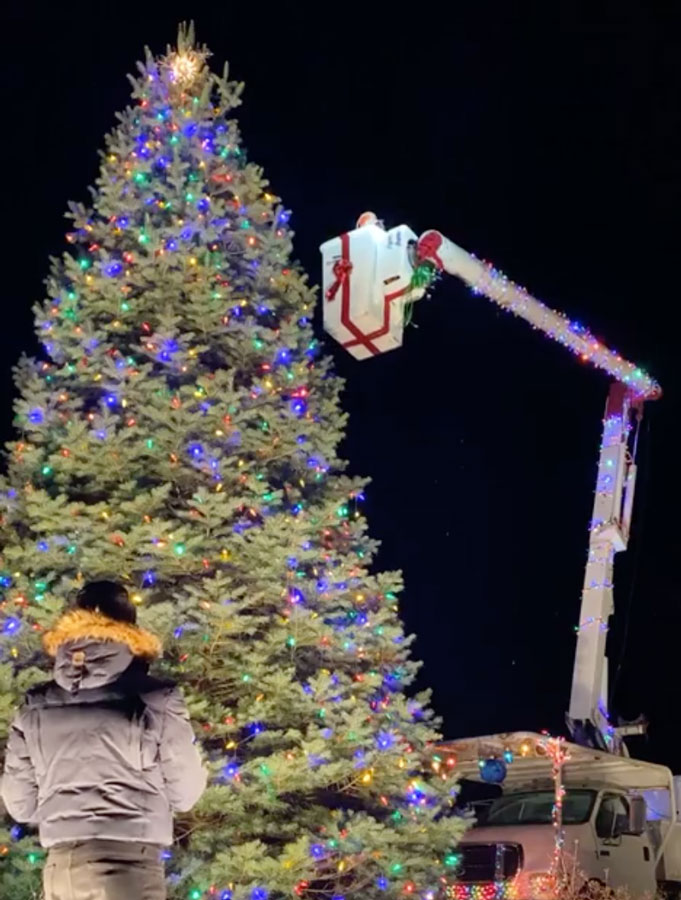 Erin singing from the bucket truck